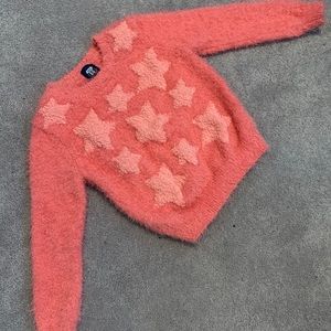Fuzzy star sweater.